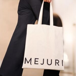 MEJURI Off-White/Cream Cotton Canvas Logo Tote Bag